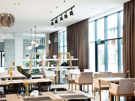 Breakfast, lunch, dinner served; international cuisine