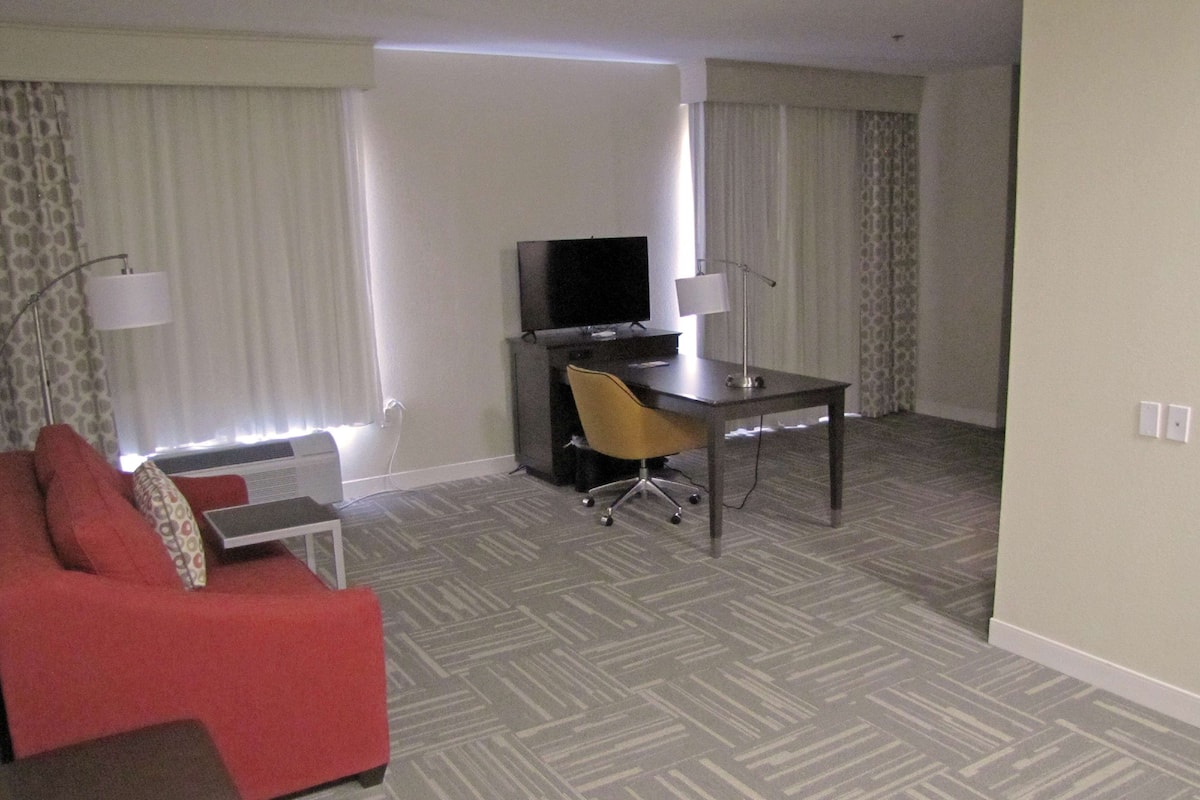 Suite, 2 Queen Beds, Non Smoking | Living area | 42-inch LCD TV with cable channels, TV