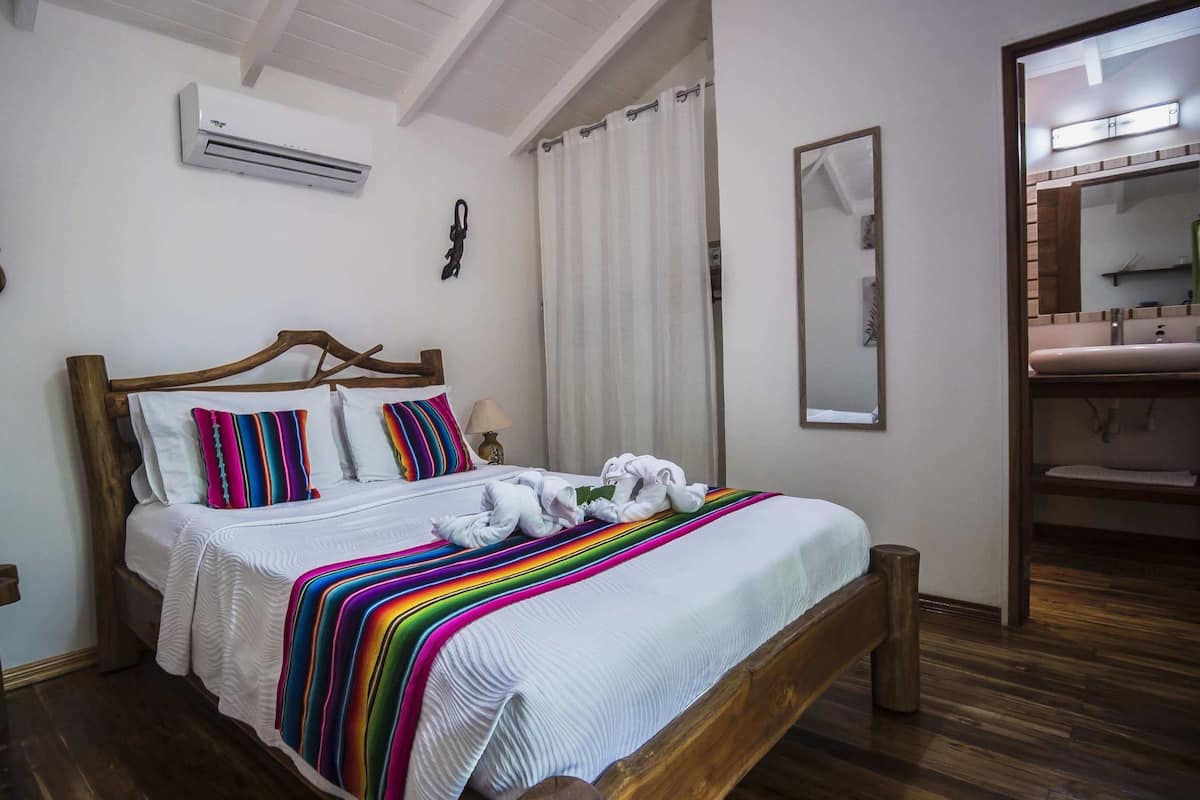 Bungalow, 1 Queen Bed | 1 bedroom, free minibar items, in-room safe, soundproofing