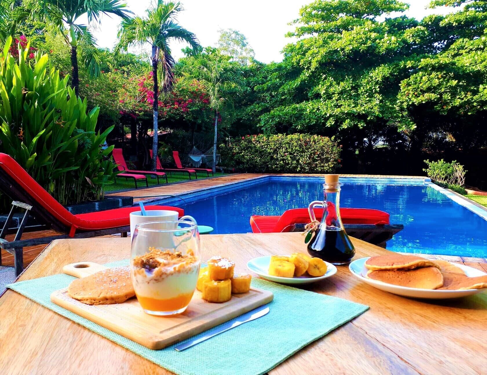 Daily cooked-to-order breakfast (USD 8 per person)