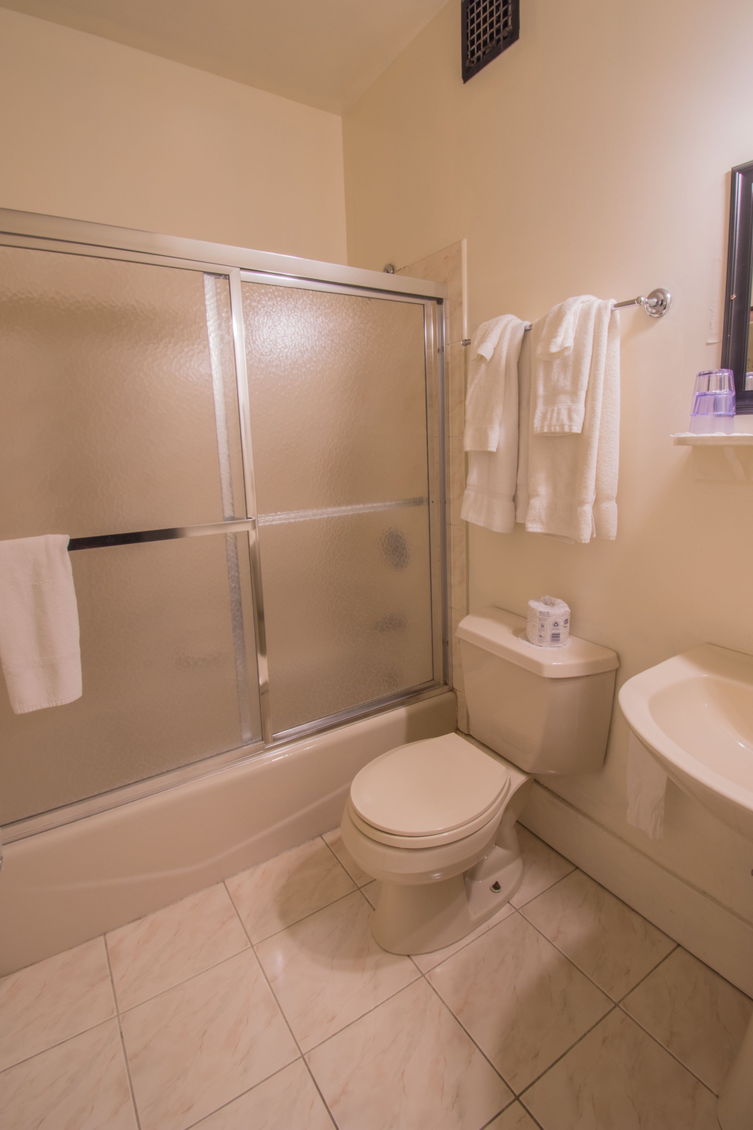 room, 2 double beds | bathroom | combined shower/bathtub, free toiletries, hair dryer, towels