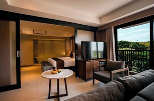 Suite Room with Balcony | Living area | 42-inch flat-screen TV with cable channels, TV