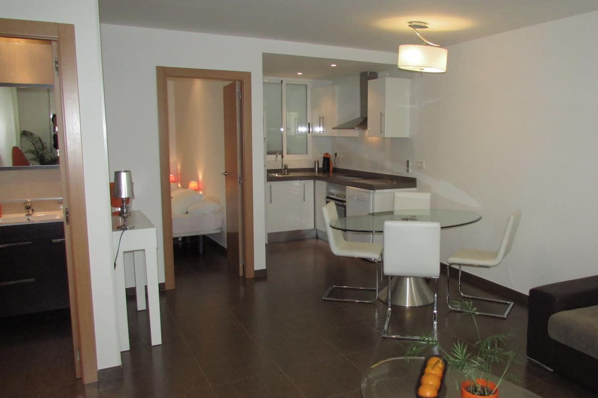 Superior Apartment, 2 Bedrooms | Living area | 32-inch flat-screen TV with digital channels, TV