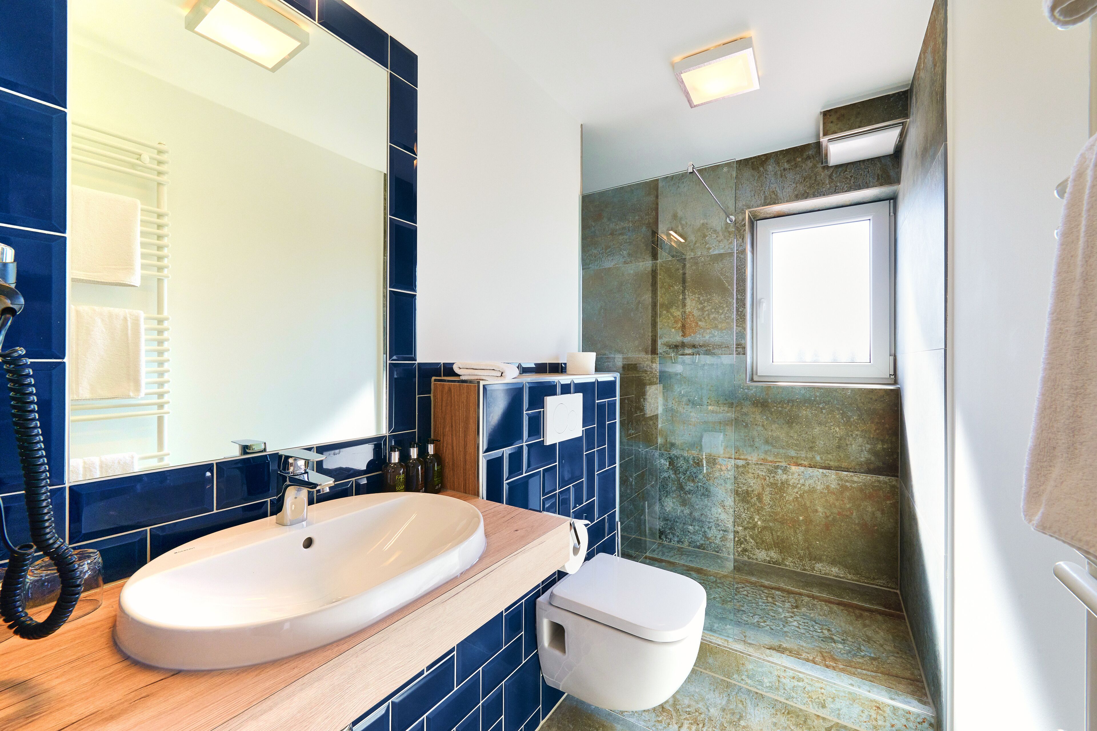 basic apartment | bathroom | shower, free toiletries, hair dryer, towels