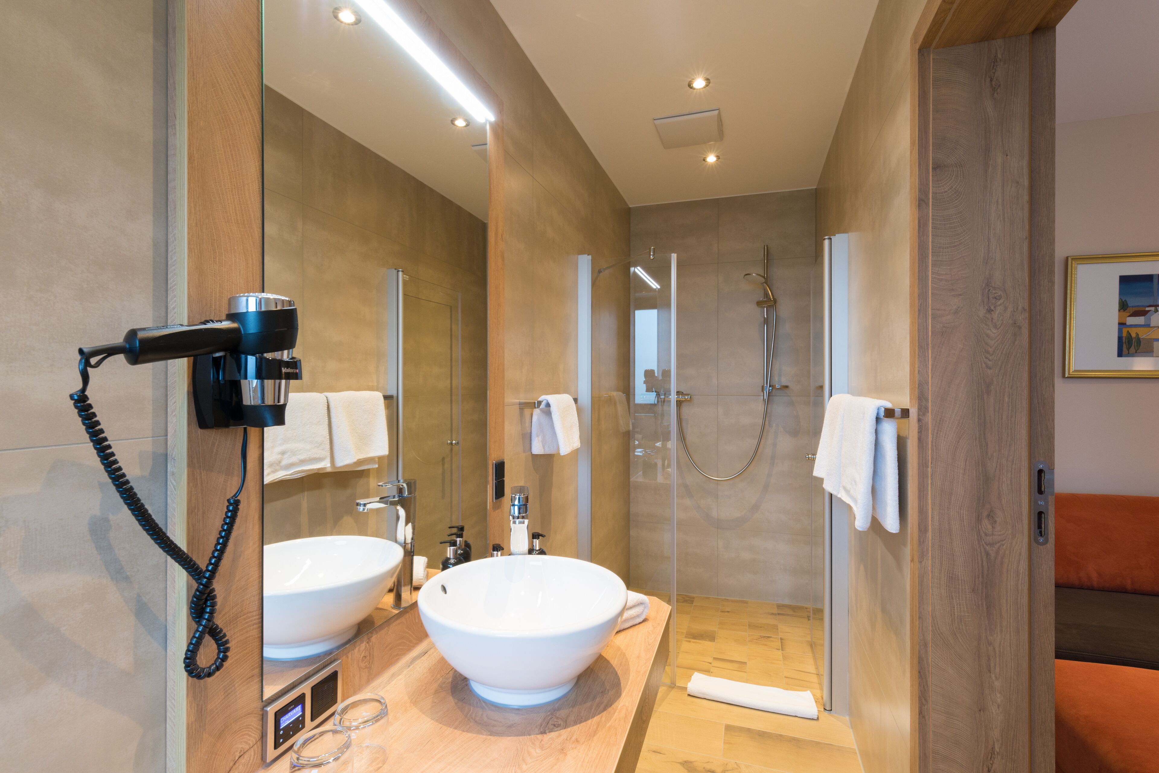 shower, free toiletries, hair dryer, towels