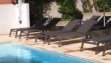 Seasonal outdoor pool, pool umbrellas, sun loungers