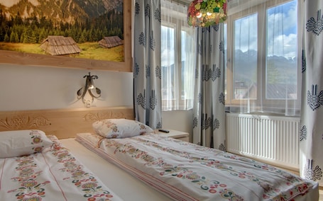 Ropa de cama de alta calidad y tabla de planchar con plancha