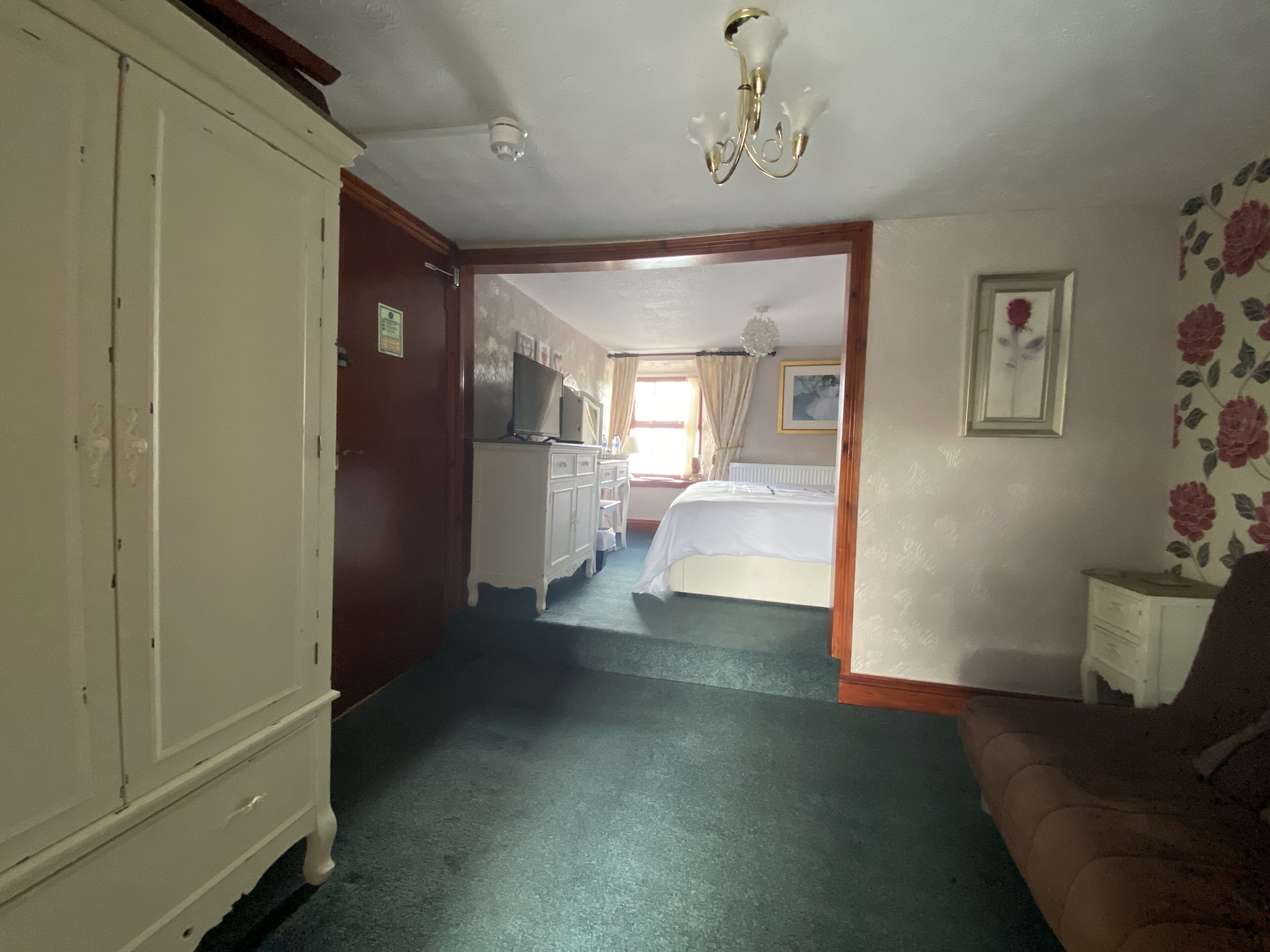 room 1 family room, river view (dog friendly x 1 dog) | living area | flat-screen tv