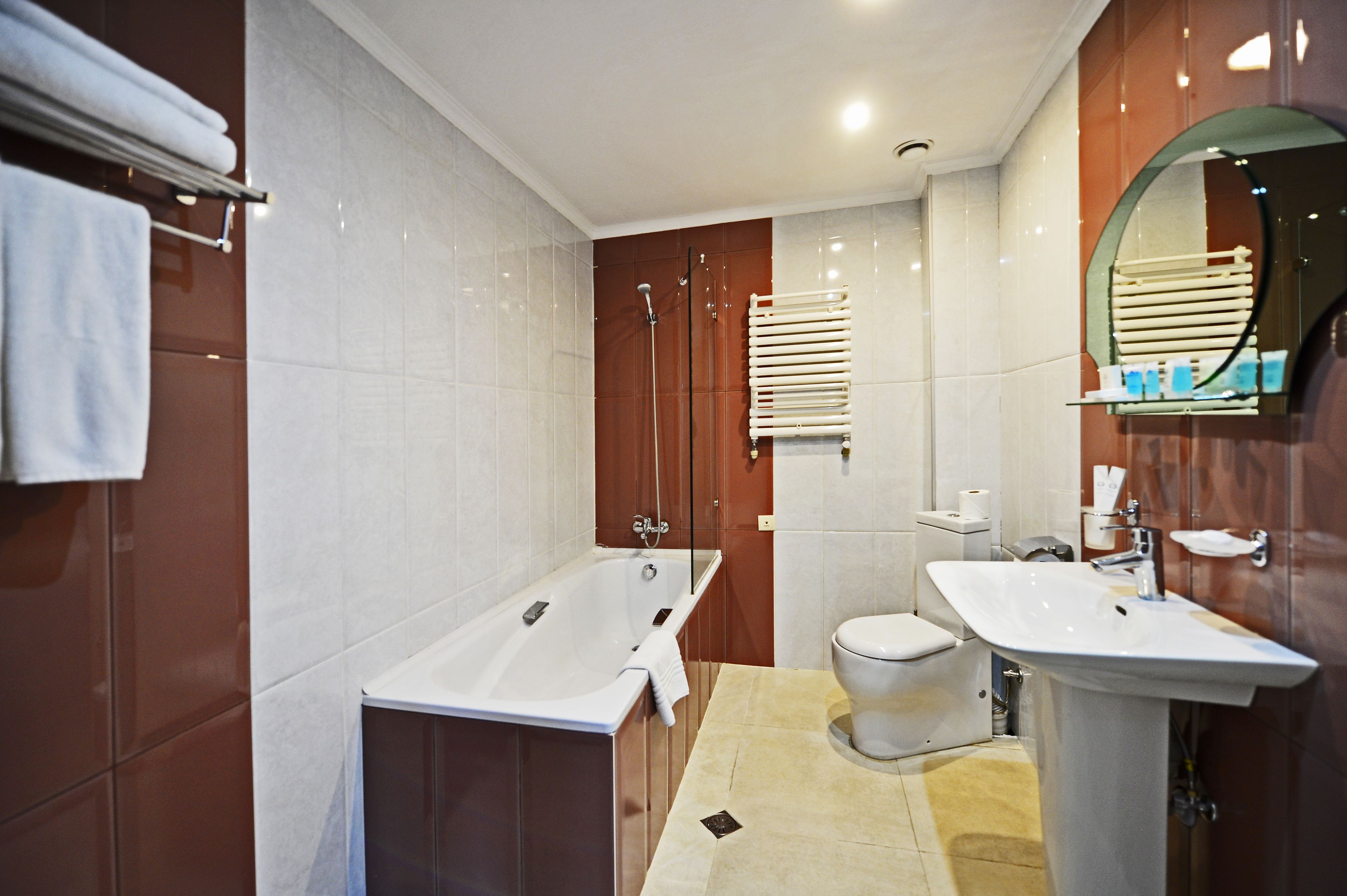 executive suite | bathroom | free toiletries, hair dryer, bathrobes, slippers