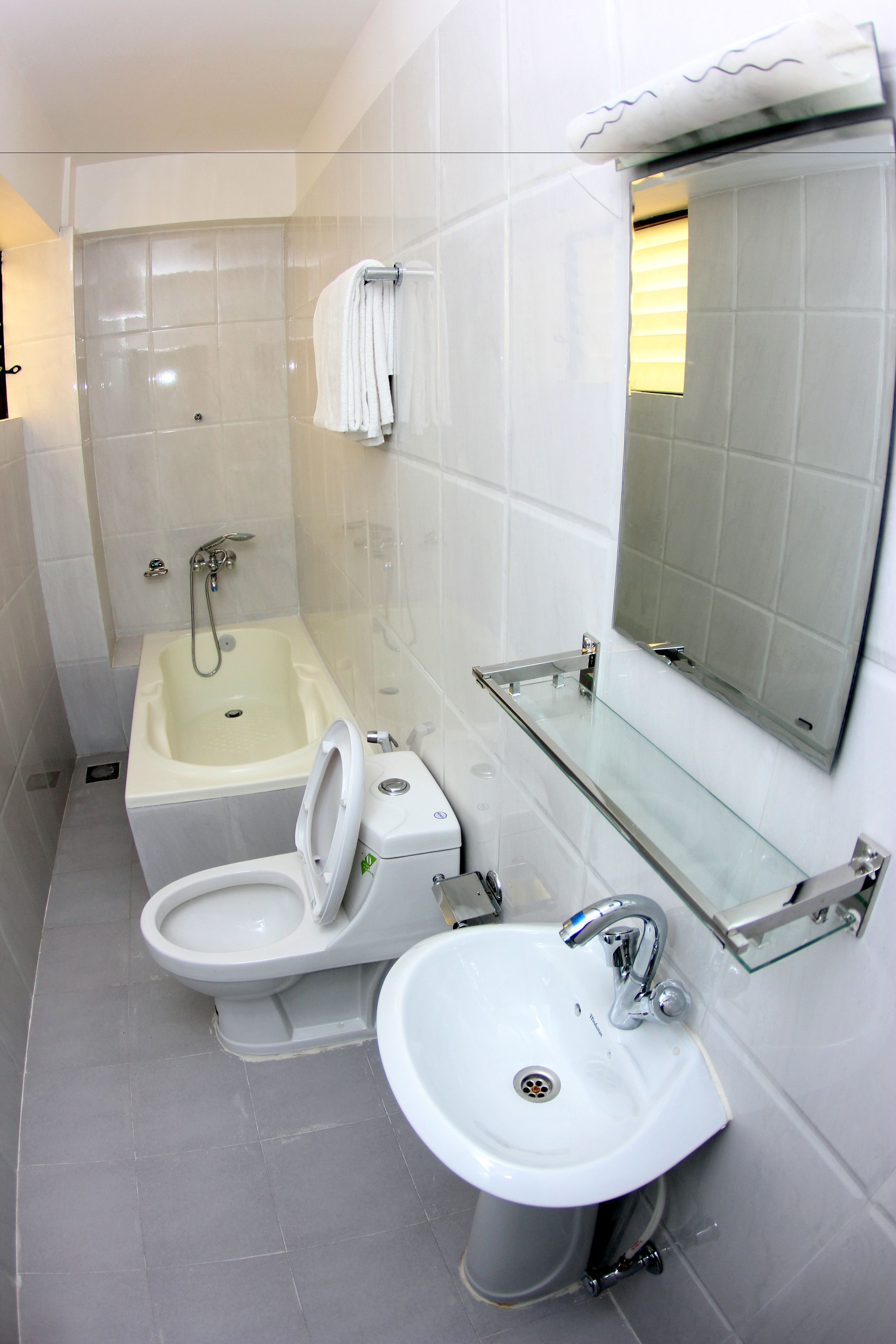 twin deluxe room | bathroom | free toiletries, hair dryer, bathrobes, slippers