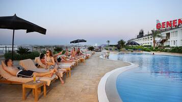 Outdoor pool, pool umbrellas, pool loungers