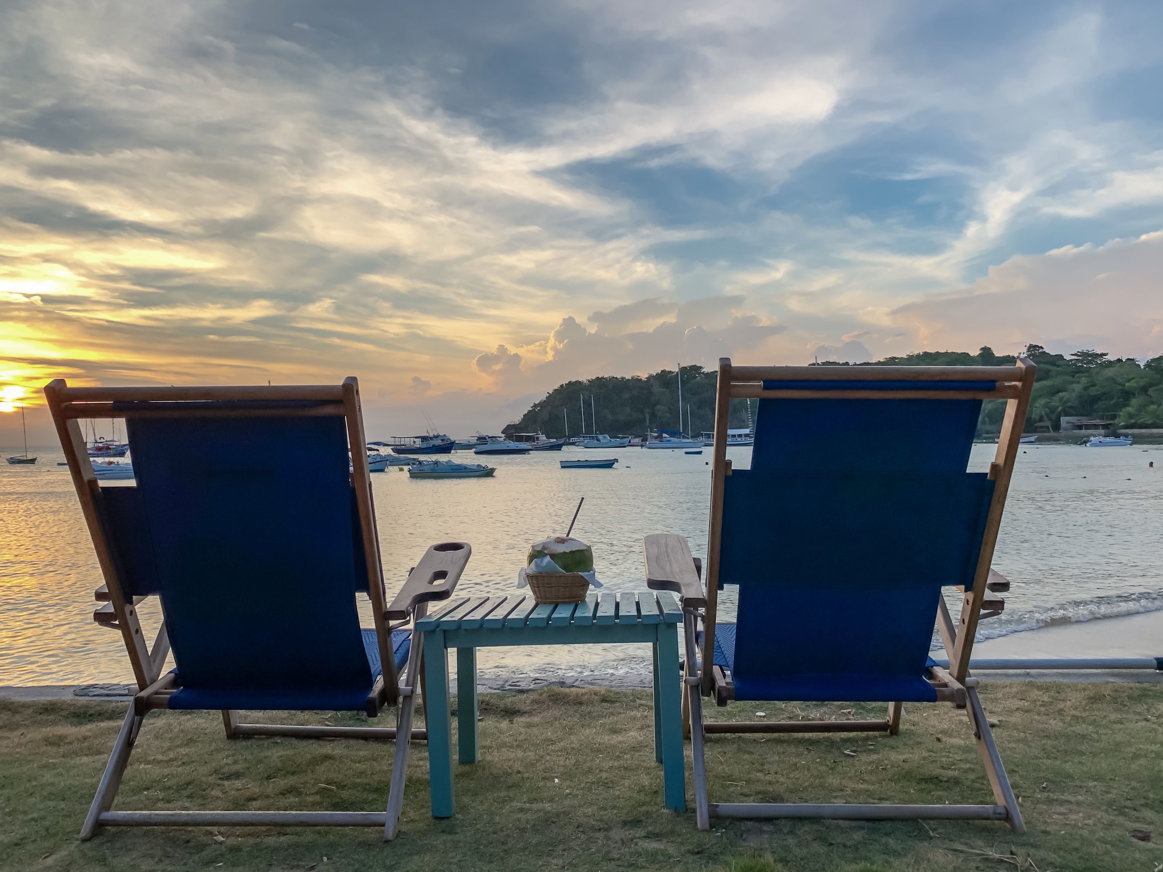 on the beach, sun-loungers, beach umbrellas, beach towels