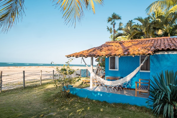 Standard Triple Room, Ocean View | Minibar, bed sheets
