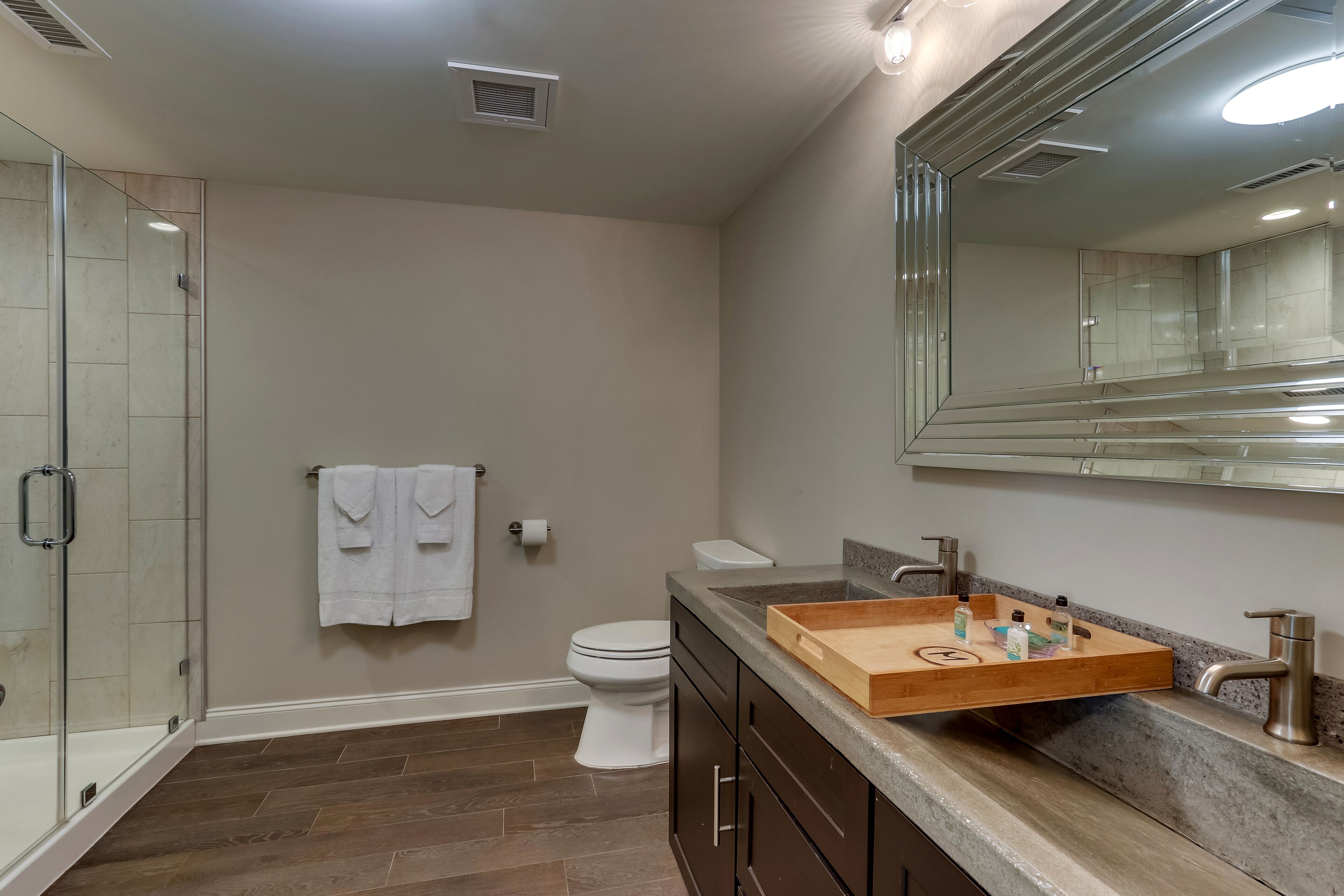 executive king suite | bathroom | shower, free toiletries, hair dryer, bathrobes