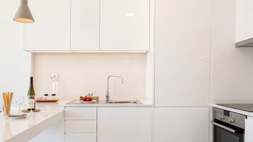 Duplex, 2 Bedrooms | Private kitchen | Full-size fridge, microwave, stovetop, dishwasher