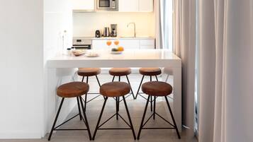 Duplex, 2 Bedrooms | Living room | 43-inch Smart TV with cable channels