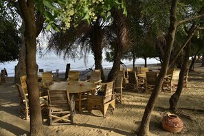 Breakfast, lunch served; international cuisine, al fresco dining