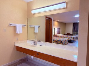 Room, Multiple Beds, Non Smoking | Bathroom | Free toiletries, hair dryer, towels