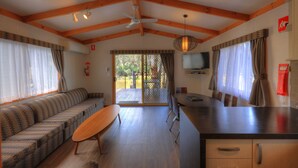 Riverfront Executive Cabin - 6 Berth - NEW | Living area | Flat-screen TV, DVD player - Moama Riverside Holiday & Tourist Park (Moama)