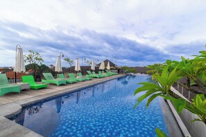 Outdoor pool, pool umbrellas, pool loungers