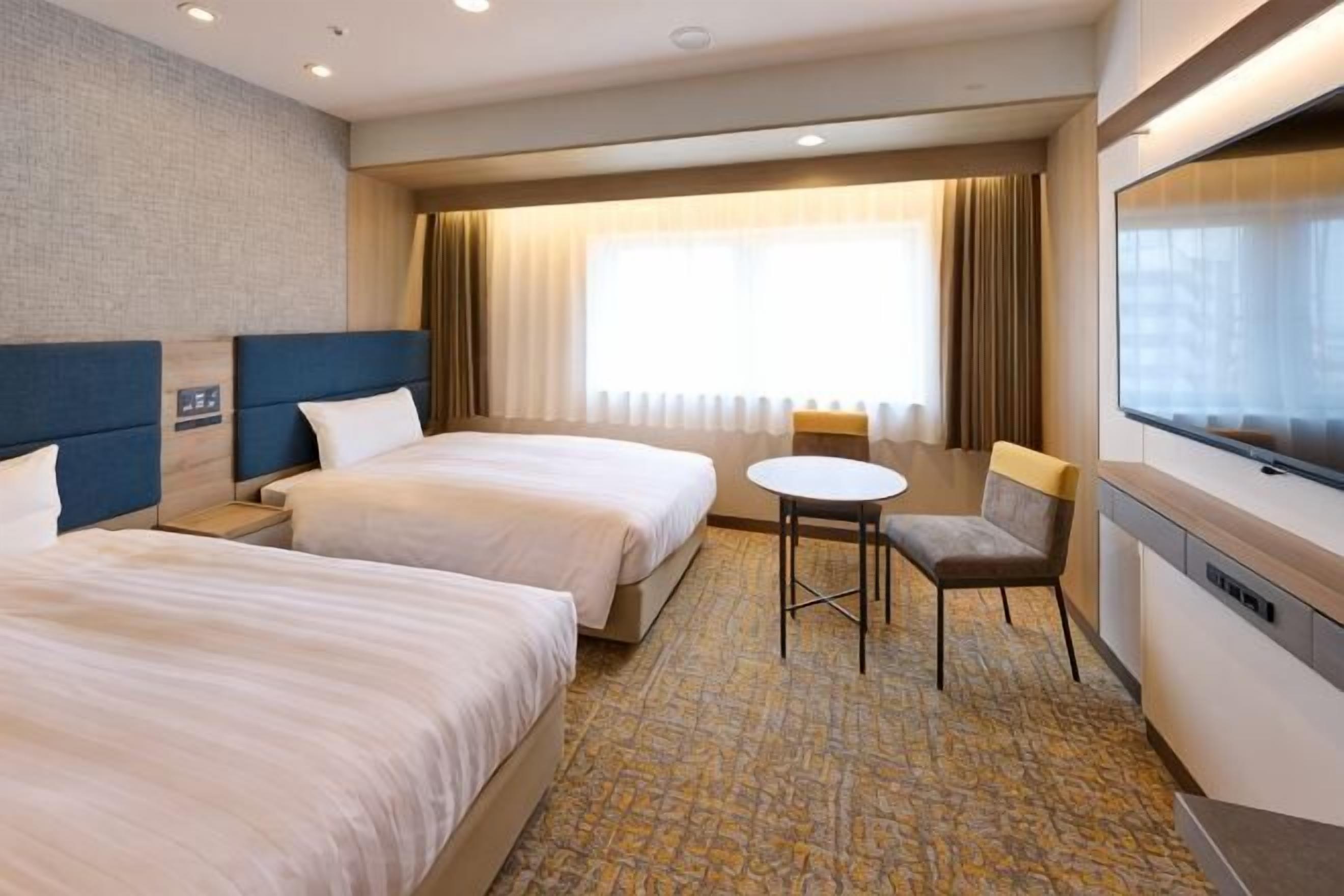 Down comforters, desk, free WiFi, bed sheets