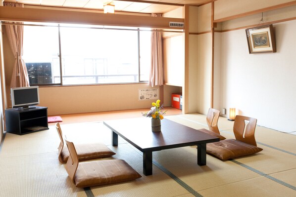 Japanese-Style Room with Shared Bathroom | Living room | Flat-screen TV - Masuya Ryokan (Kyoto)
