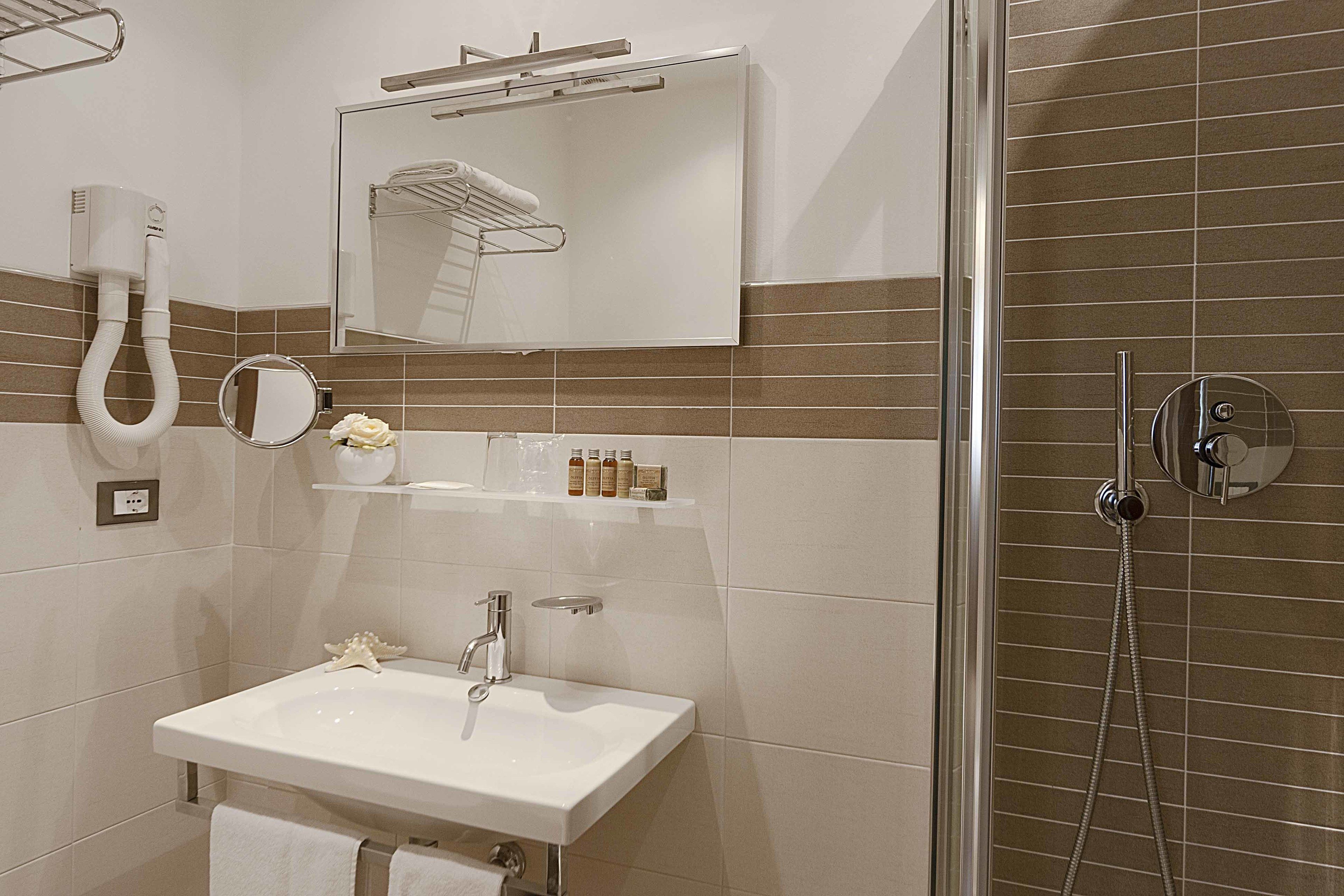 free toiletries, hair dryer, bidet, towels