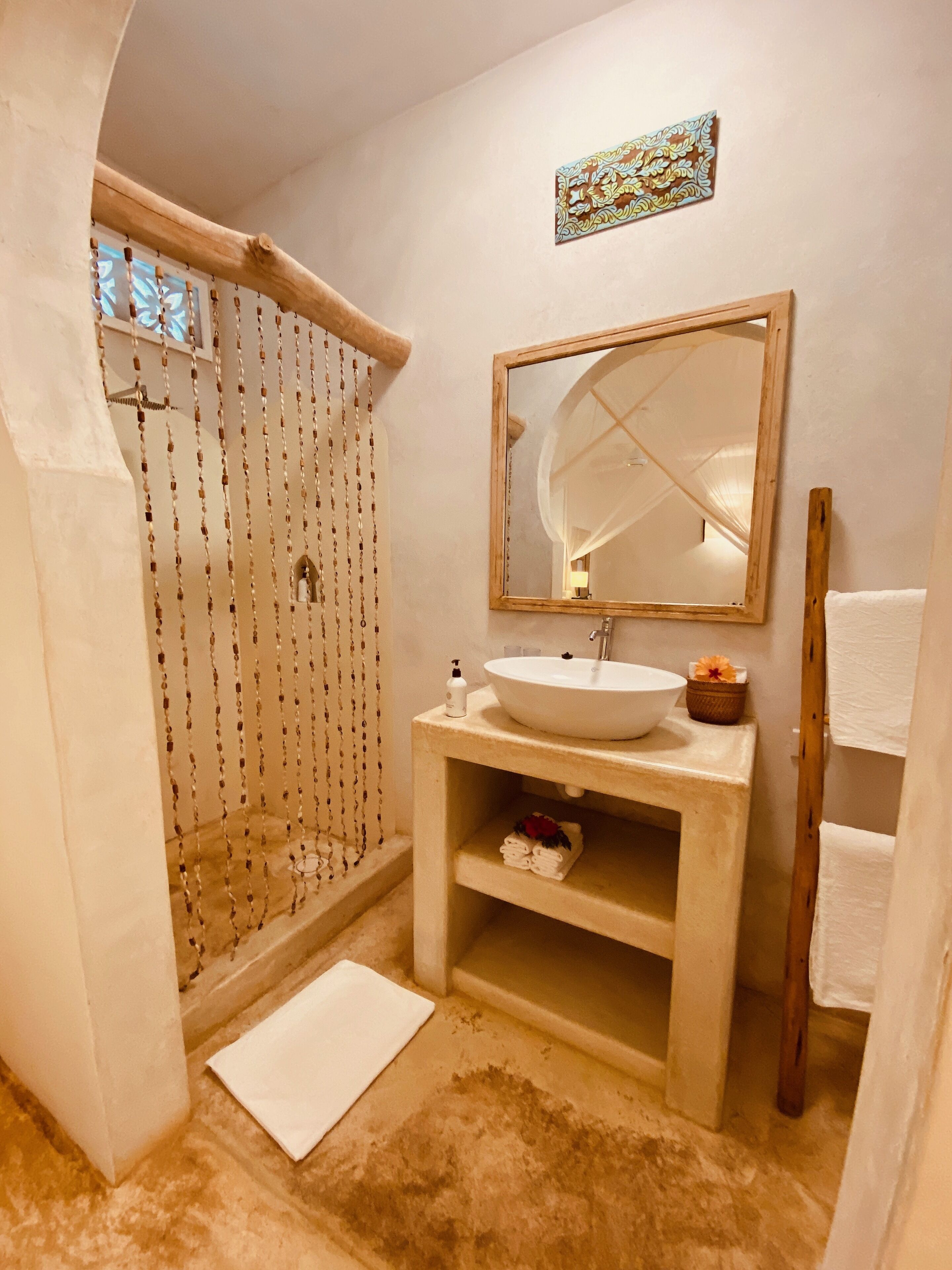 sea view villa | bathroom | rainfall showerhead, free toiletries, hair dryer, bathrobes