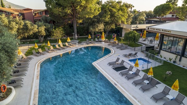 Outdoor pool, pool umbrellas, pool loungers