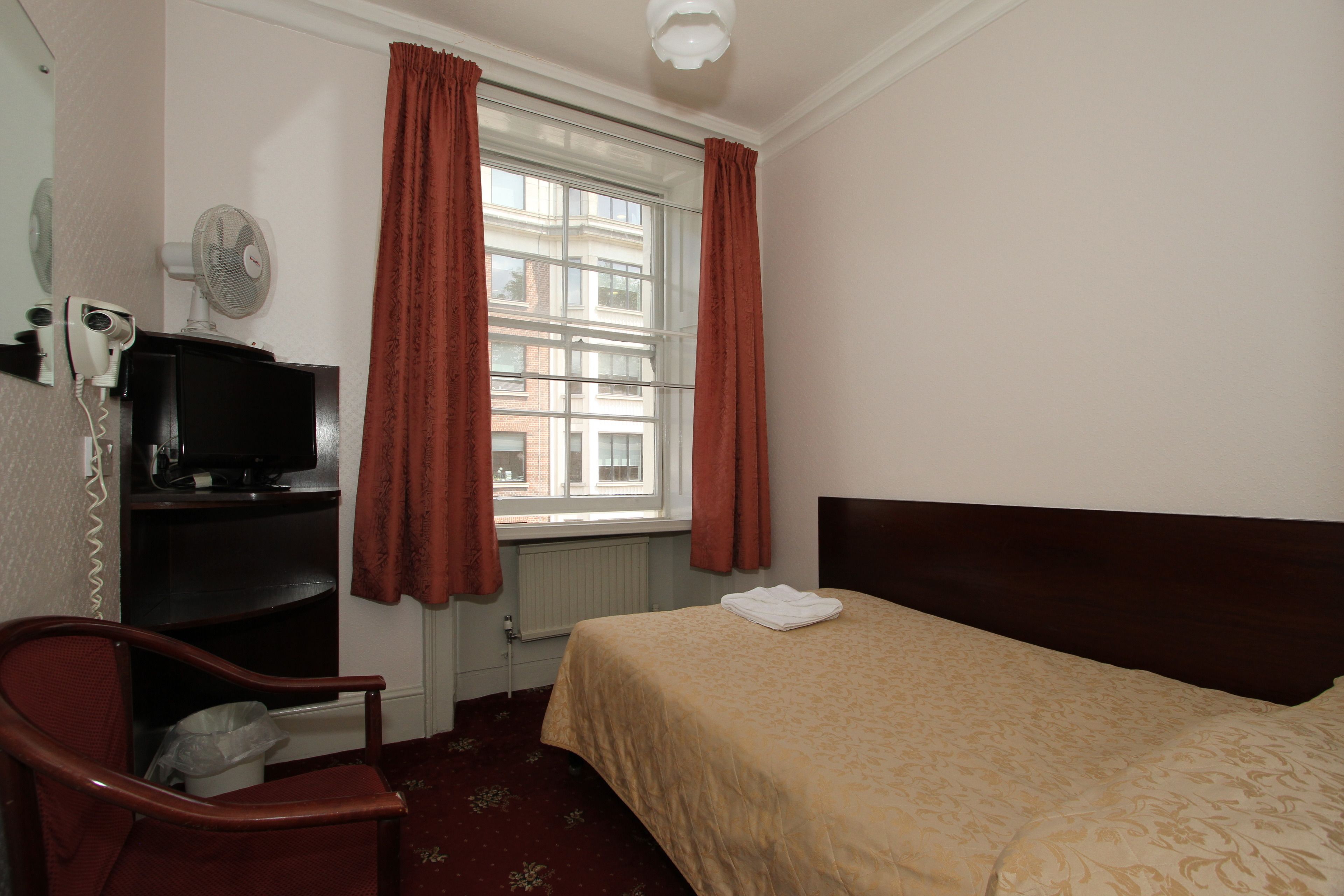 iron/ironing board, cots/infant beds, free wifi, bed sheets