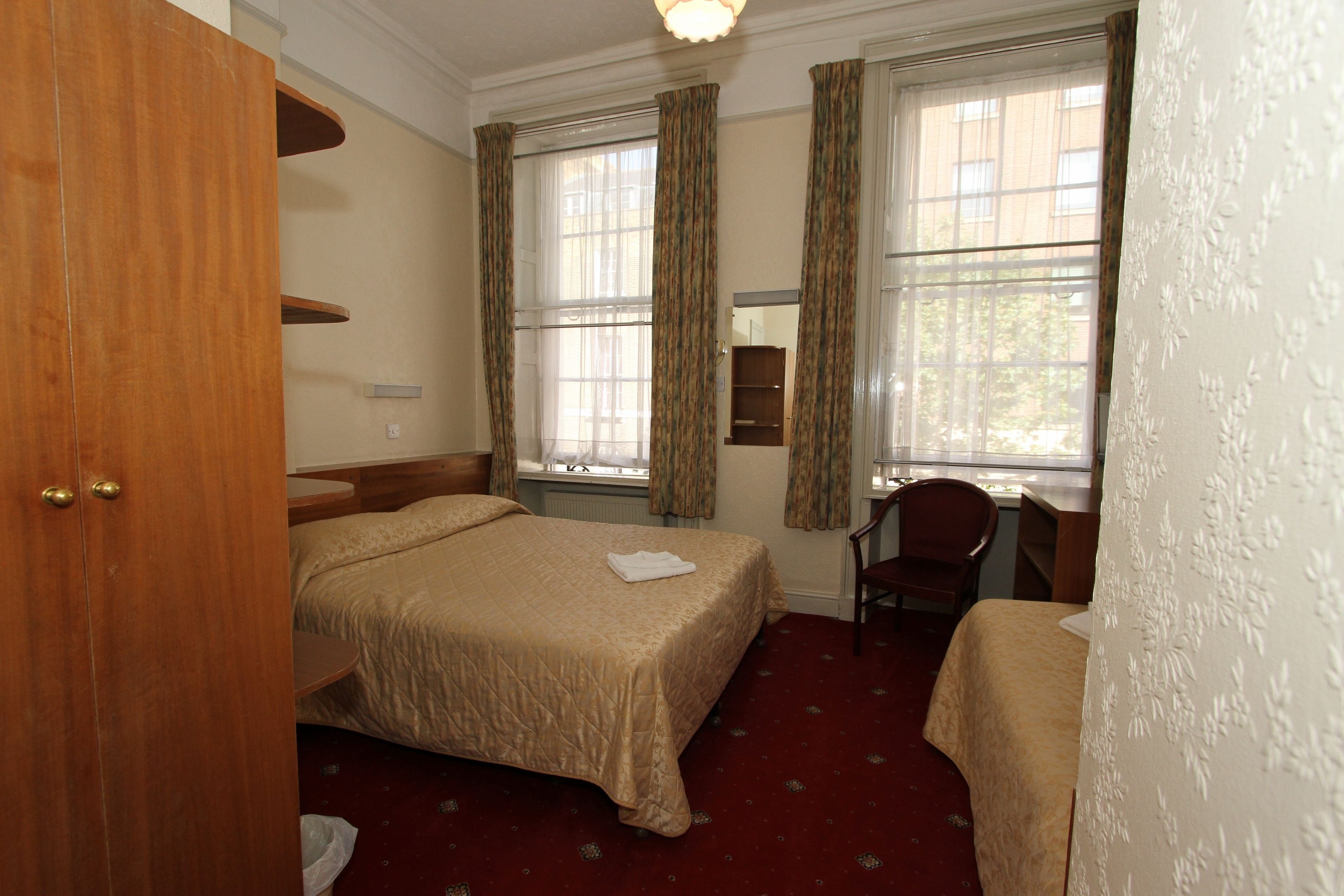 iron/ironing board, cots/infant beds, free wifi, bed sheets