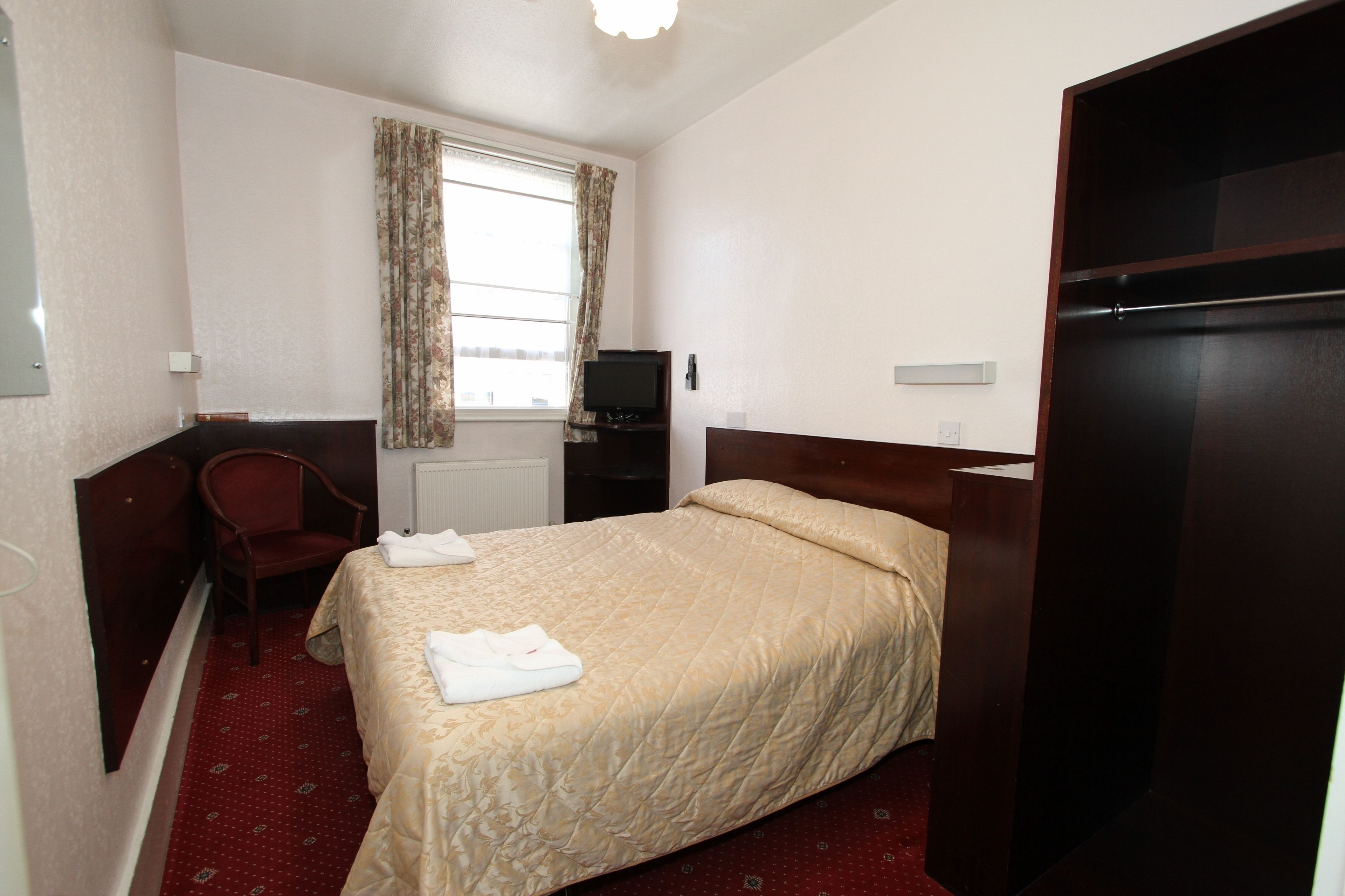 iron/ironing board, cots/infant beds, free wifi, bed sheets