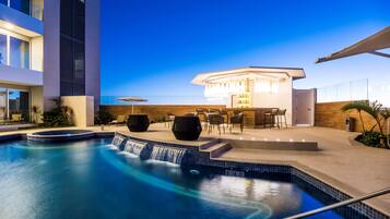 Outdoor pool, pool umbrellas, sun loungers