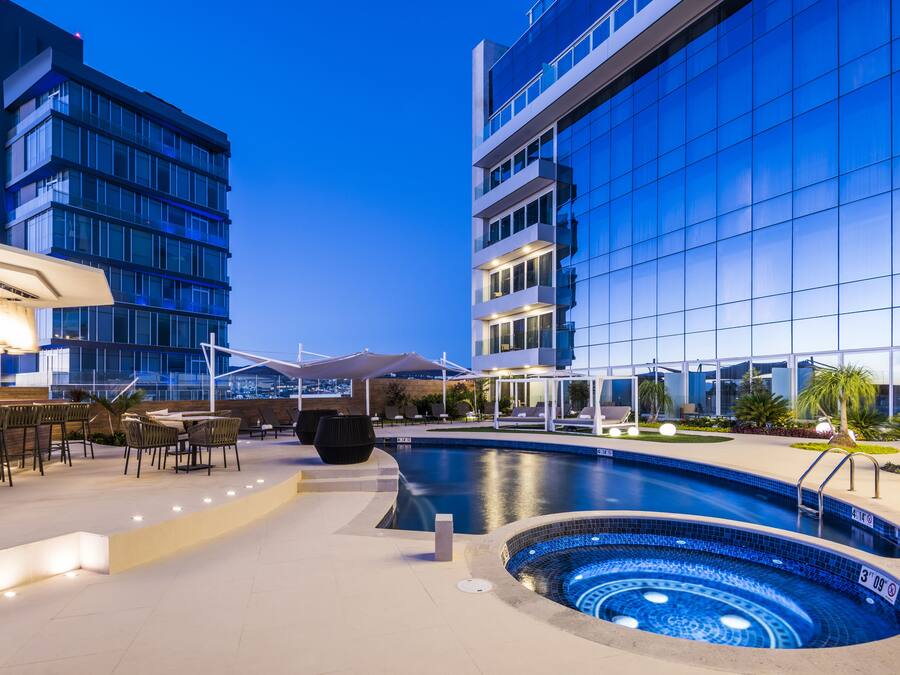 Outdoor pool, pool umbrellas, pool loungers