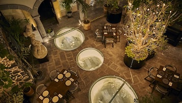 Breakfast, lunch served; international cuisine, al fresco dining