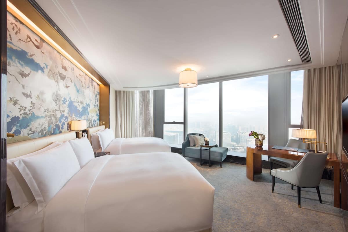 Premium bedding, down duvets, pillow-top beds, free minibar items