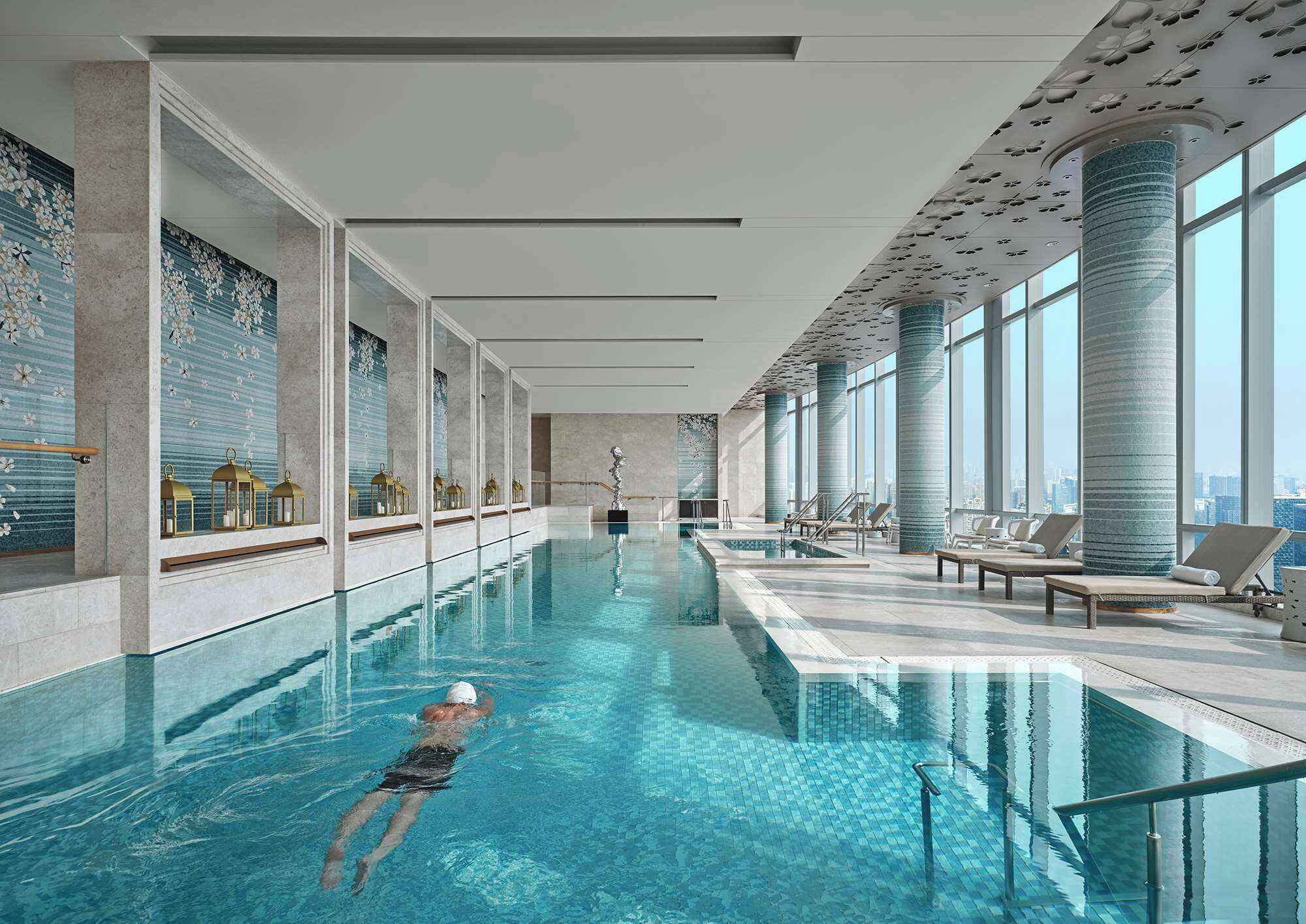 indoor pool, open 6:00 am to 10:00 pm, pool loungers, lifeguards on site