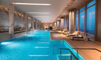Indoor pool, open 6:00 AM to 10:00 PM, sun loungers, lifeguards on site