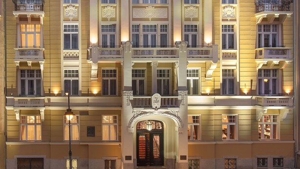 A grand building with a prominent "Olympic" sign, multiple balconies, and a classical architectural style. - Luxury Spa Hotel OLYMPIC PALACE (Karlovy Vary)