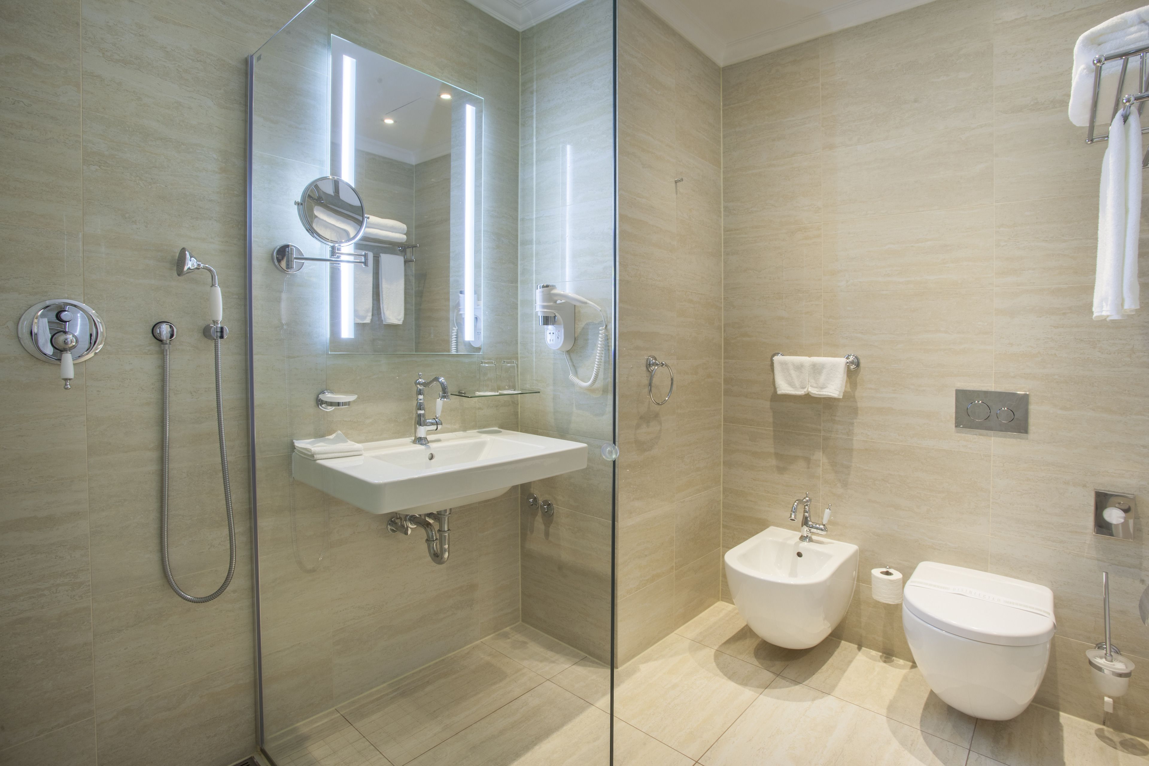 designer toiletries, bathrobes, slippers, towels