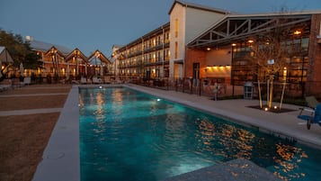 Outdoor pool, open 9 AM to 9 PM, cabanas (surcharge), pool umbrellas