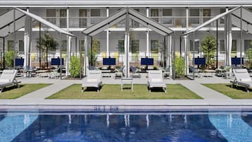 Outdoor pool, open 9 AM to 9 PM, cabanas (surcharge), pool umbrellas