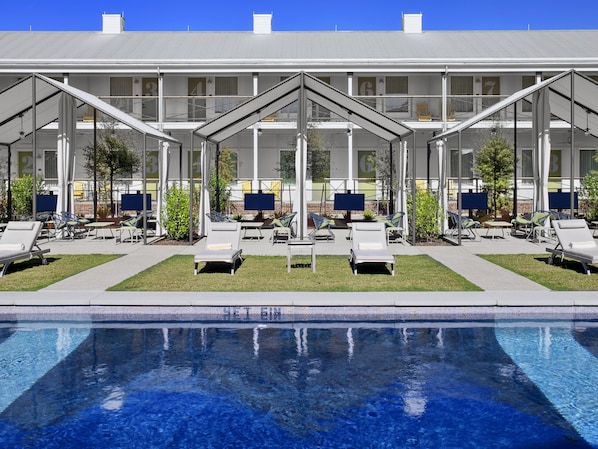 Outdoor pool, open 9 AM to 9 PM, cabanas (surcharge), pool umbrellas