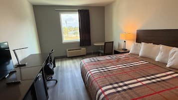 Standard Room, 1 King Bed | Desk, iron/ironing board, free WiFi, bed sheets