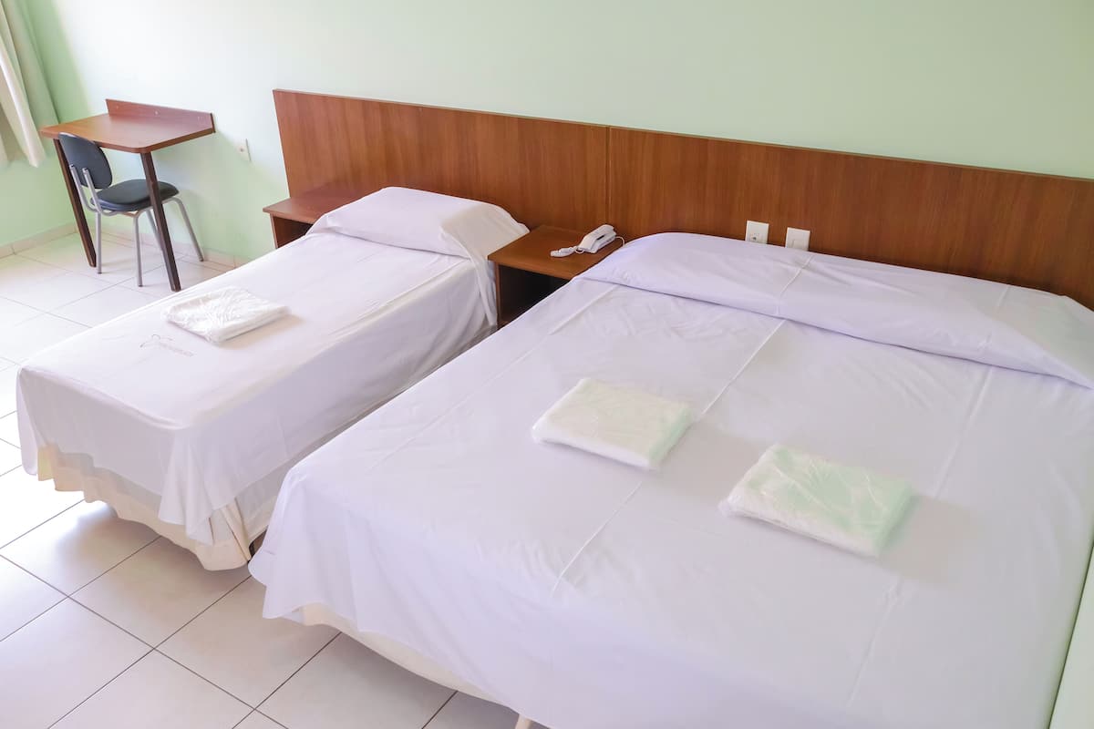 standard triple room | 1 bedroom, minibar, desk, blackout curtains