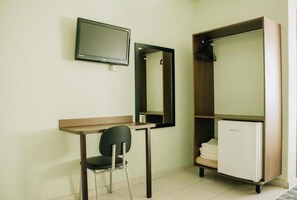 1 quarto, frigobar, escrivaninha, cortinas blackout