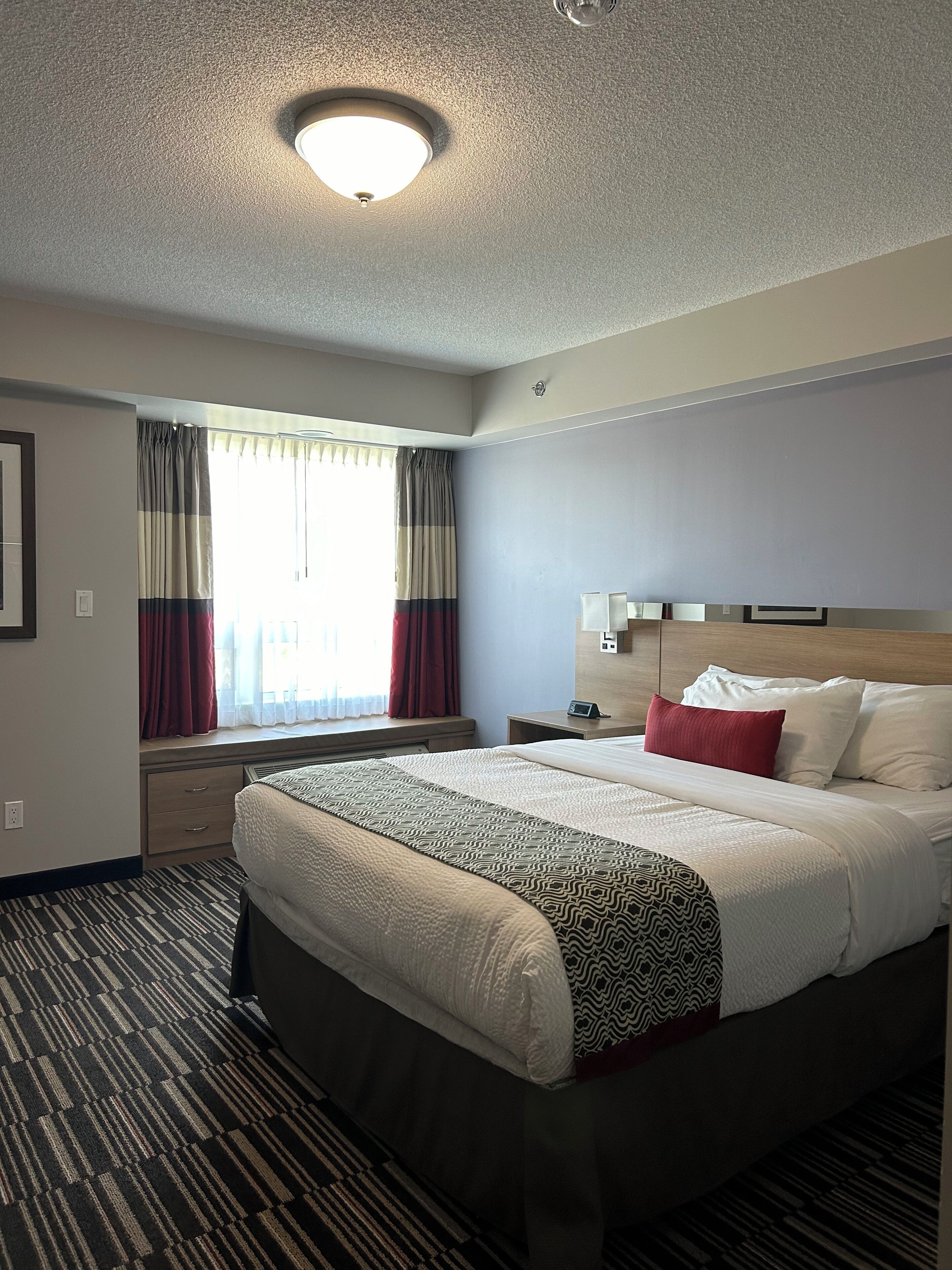 suite, 1 queen bed, non smoking, kitchenette | desk, iron/ironing board, free wifi, bed sheets