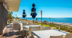 Breakfast, lunch served; local and international cuisine, beach views 