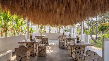 Breakfast, lunch, dinner served; Fusion cuisine, pool views