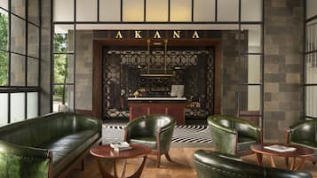 Welcome to AKANA, where guests can relax in style amidst comfortable leather sofas and armchairs.